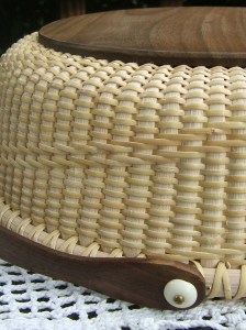 Wooden base and handle.